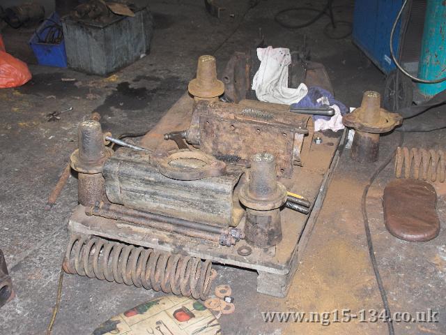 The dismantled pony truck side compensation units showing the internal springs now removed.