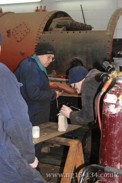 Brazing on of pipe ferrules. (photo: Laurence Armstrong)