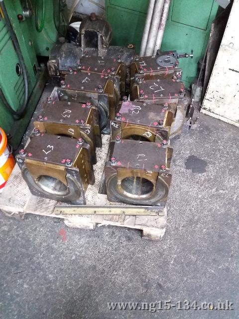 The driving wheel axle boxes having had the oil well securing bolts drilled for securing wires. (Photo: Ben Smith)