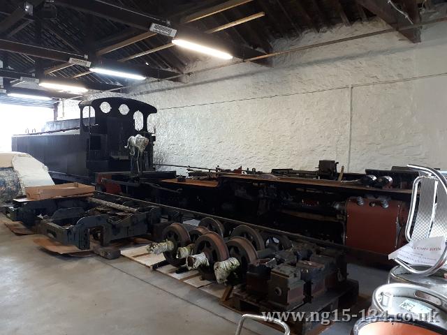 The tender (on 133's chassis) and frames in the goods shed behined 134's tender bogie components. (Photo: David Oates)