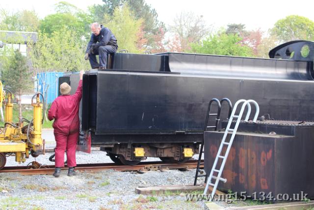 Working on the tender tank to move the position of the rear steps vacuum pipe meandering its way around the smokebox saddle