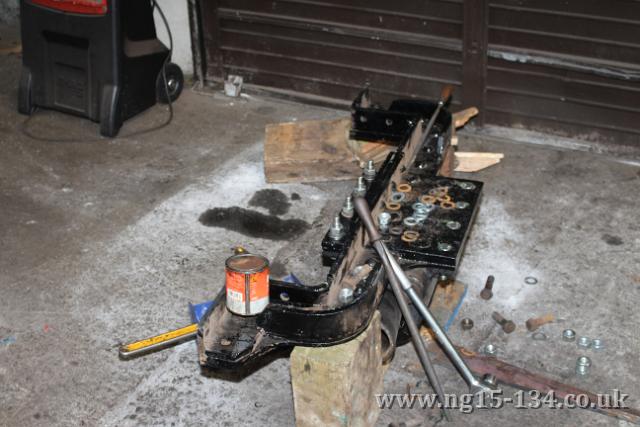 Fitting the side control spring unit onto the pont truck frame section. (photo: Laurence Armstrong)