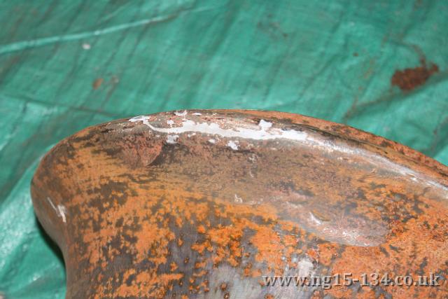 A crack in the chimney rim having been filled with high temperature filler. (Photo: Laurence Armstrong)